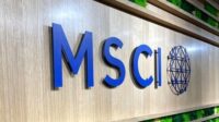 Logo MSCI dengan latar belakang grafik pasar keuangan global.