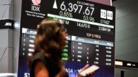 956a82cd418366b7ad7bba4f484125b8.jpg Grafik pergerakan Indeks Harga Saham Gabungan (IHSG) di layar monitor bursa efek